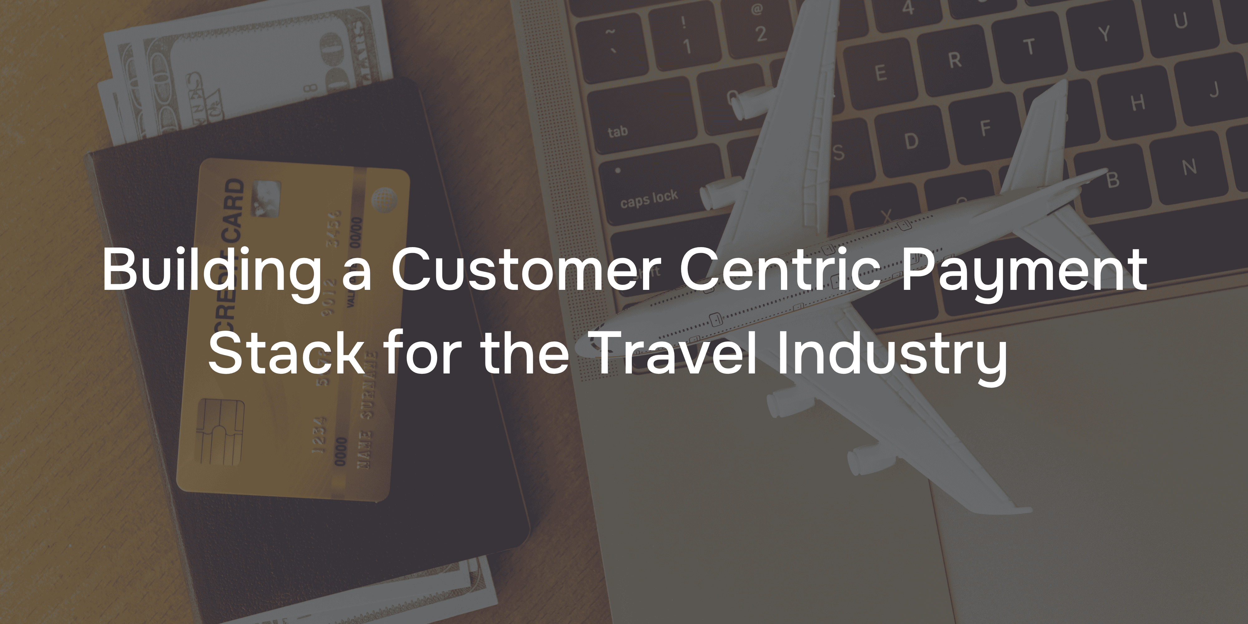 Aeroplane and credit card on laptop